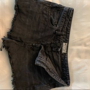 Free People black denim shorts